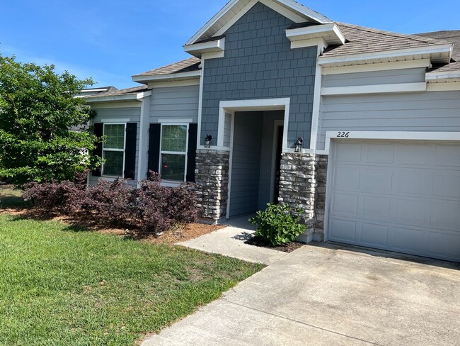 Building Photo - FOUR BEDROOMS and THREE BATHS For Rent