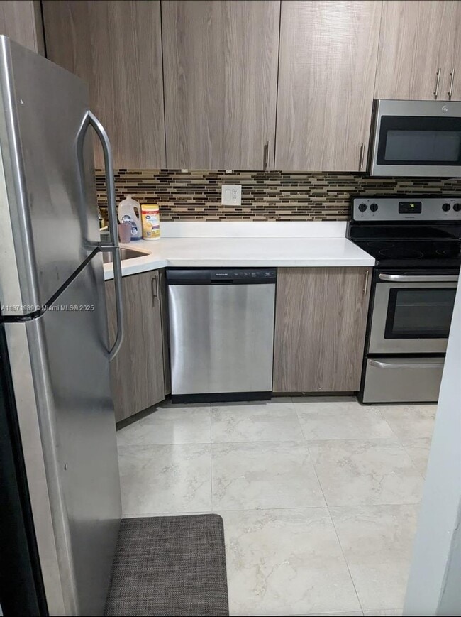Building Photo - 7480 NW 17th St Unit 303 Rental