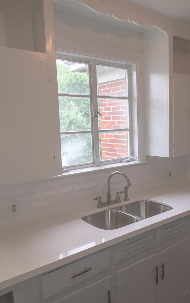 Modern style kitchen w/cool color tones - 2001 Center St Unit 4