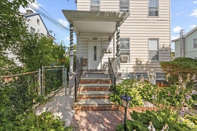 Building Photo - 407 N MacQuesten Pkwy Unit 2 Rental