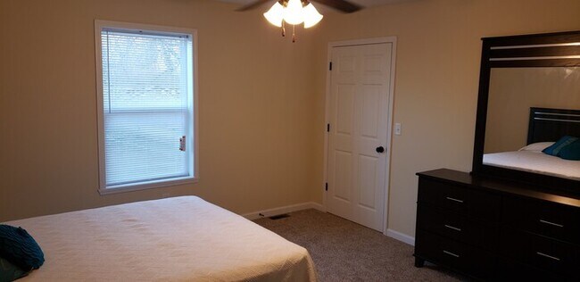 Photo - Spacious 2BR Upper Apartment, Pet-Friendly...
