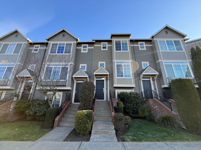 Photo - Bright 3-Level Townhome with Open-Concept Living, Built-In Fireplace & Included Wi-Fi