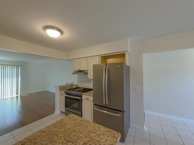 Photo - Move-In Ready Ranch Condo with Basement & Prime Location