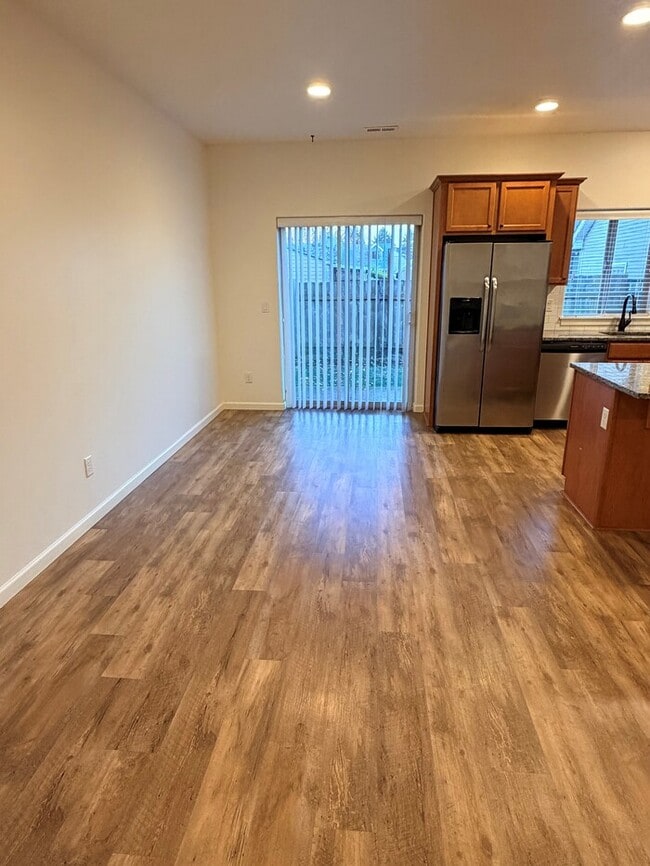 Beautiful Home w/Gas Fireplace, Plank Flooring, Fenced Yard, Garage, W/D & MORE!