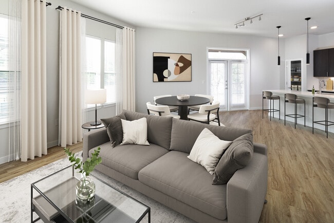 Dining and living room with hard surface flooring