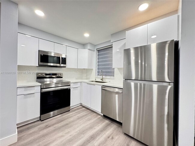 Building Photo - 6175 NW 186th St Unit 109