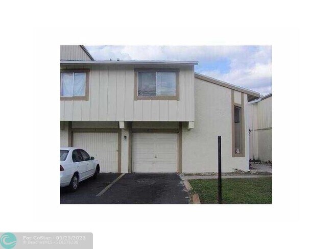 Building Photo - 2222 NW 59th Wy Unit 63-E Rental