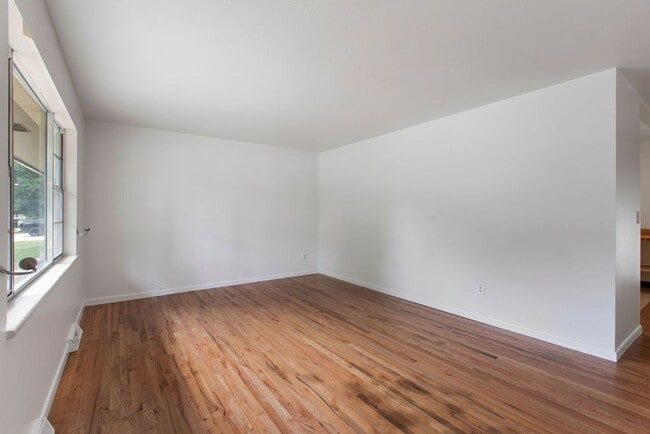 Photo - Student Friendly! Spacious 5 Bedroom, 2 Bath Home with Finished Basement and Attached Garage