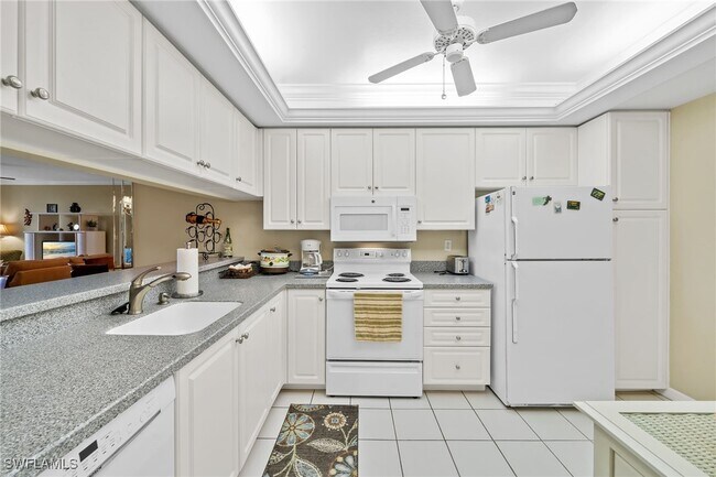 Building Photo - 14771 Hole in 1 Cir Unit 108