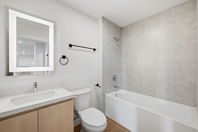 Photo - 2 Bedroom + Den  & 3 Bedroom Apartment Unité 209