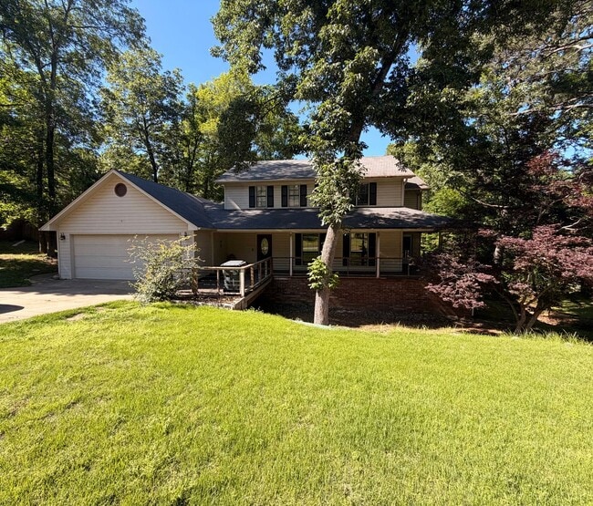 Photo - Discover this spacious 4-bedroom, 2.5-bathroom home in Russellville, AR