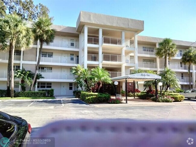 Building Photo - 3051 S Palm Aire Dr Unit 208 Rental