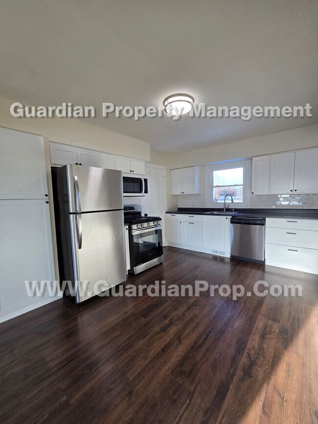 Photo - SxS duplex Available now! LVP flooring throughout, independent living areas each W/ full kitchen ...