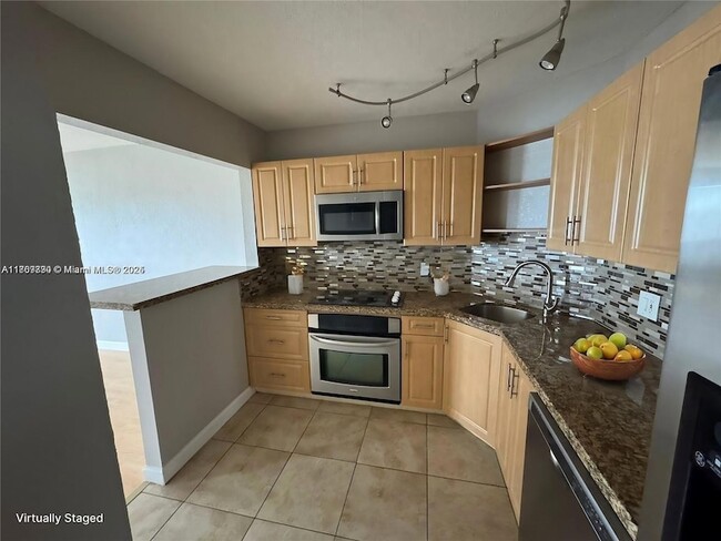 Building Photo - 3301 Spanish Moss Terrace Unit 604 Rental