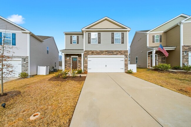 Building Photo - Spacious 5-Bedroom Home for Rent in The Falls – Modern, Comfortable, and Move-In Ready