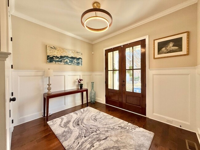 Photo - Luxurious 3BD, 4BA Raleigh Townhome with a First Floor Master Bedroom, Bonus Sunroom, and Large U...