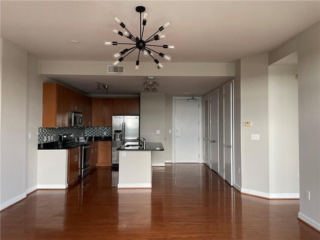 Building Photo - 711 Cosmopolitan Dr NE Unit 723