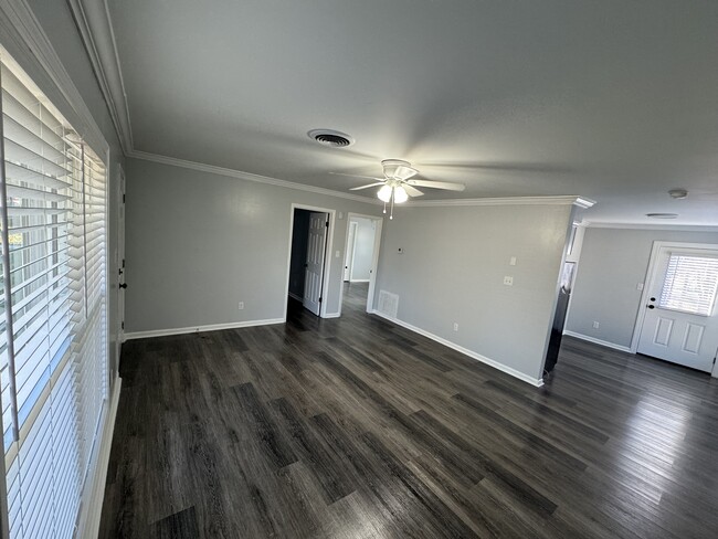 Living room and dining room area - 1835 W Jackson St Apartment Unit B