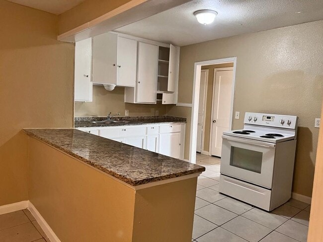 Photo - Completely Renovated, huge back yard and close to everything!