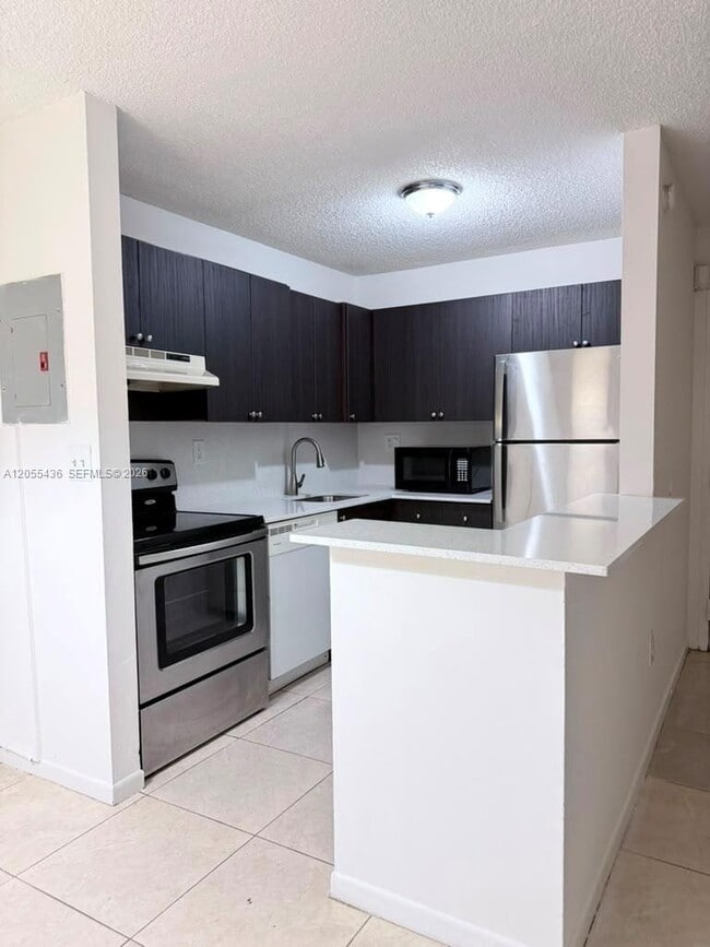 Photo - 7090 NW 179th St Unit 107