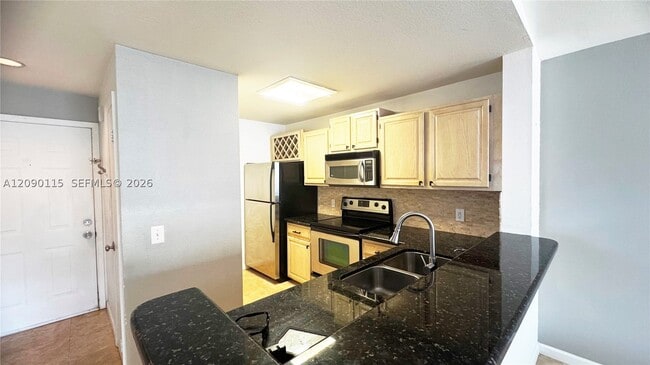 1760 Palm Cove Blvd Unit 5-305
