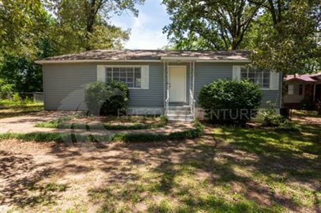 Building Photo - Flexible 3BR/2BA or 2BR + Den Home
