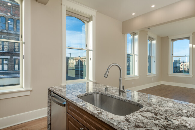 Apartment 4 kitchen and spectacular windows - The Block Apartments