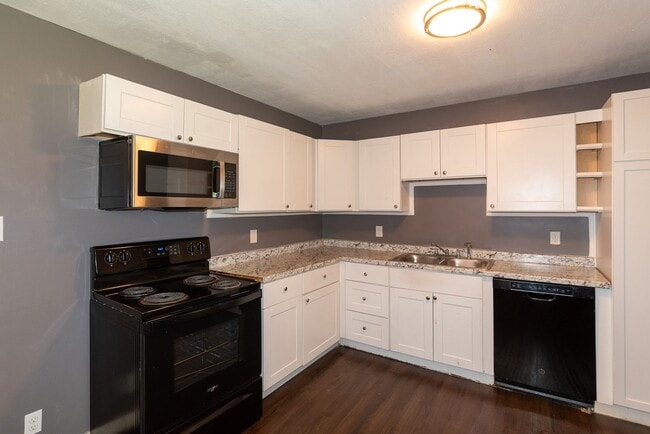 Photo - This charming 5-bedroom, 2-bathroom home is available for $2,000/month.