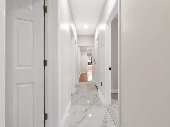 Photo - 3-Bedroom Gem with Modern Comfort in Bayonne – 1300 Sq. Ft. of Urban Living!"