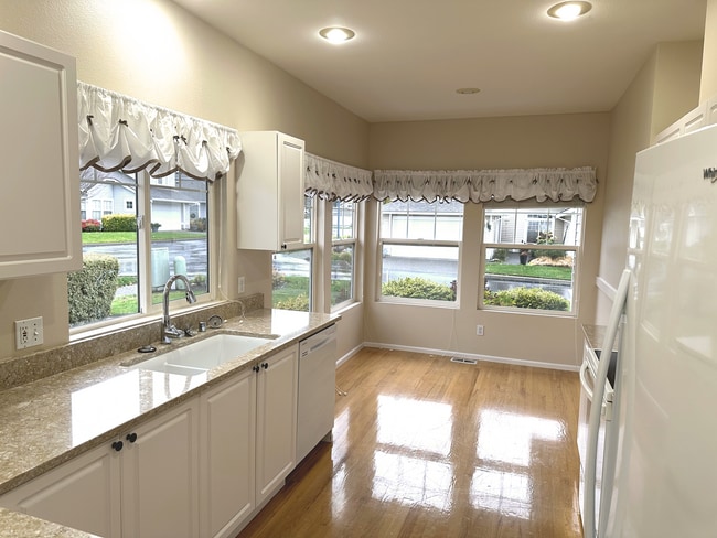 Photo - Elegant Gated Townhome with Main-Floor Primary Suite at Marina Pointe Kent