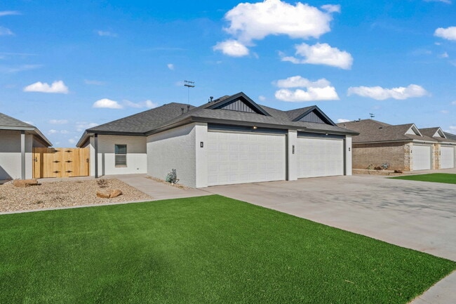 Building Photo - Like-new duplex in Frenship East! Unit B