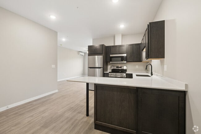 2BR, 2BA - 906SF - Kitchen and Living Room