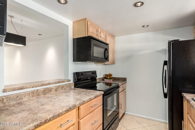 Building Photo - 4701 N 68th St Unit 240