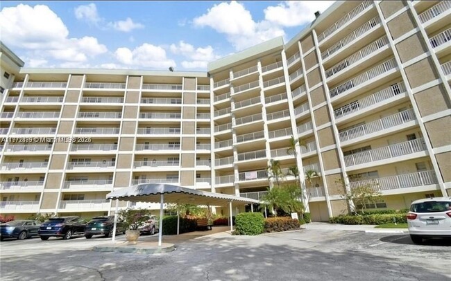 Building Photo - 3090 N Course Dr Unit 405 Rental