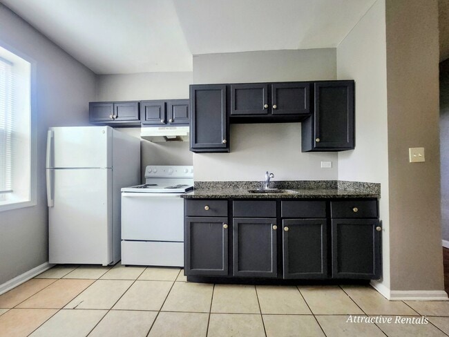 Photo - 1465 E 68th St Unit 2