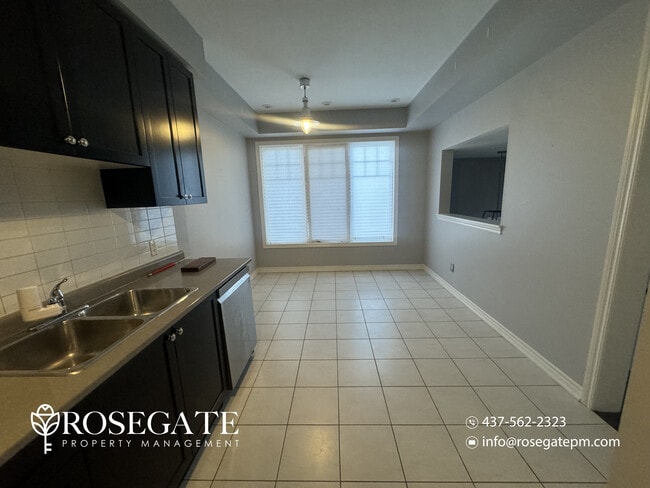 Photo - Spacious 3+1 Bedroom Freehold Townhouse with Garage & Fenced Backyard in Brampton