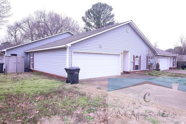 Building Photo - First month move in special $900!! Beautiful 3-bed, 2 bath condo with 2-car garage - includes was...