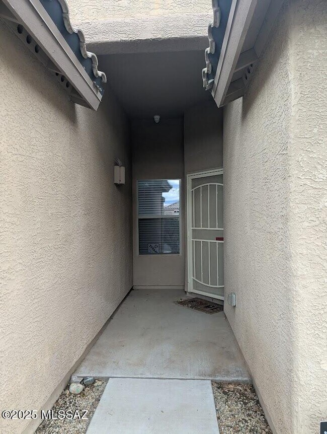 11483 W Magic Song St
