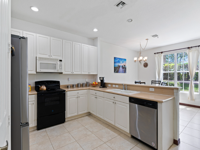 Photo - 9945 E Villa Cir Townhome