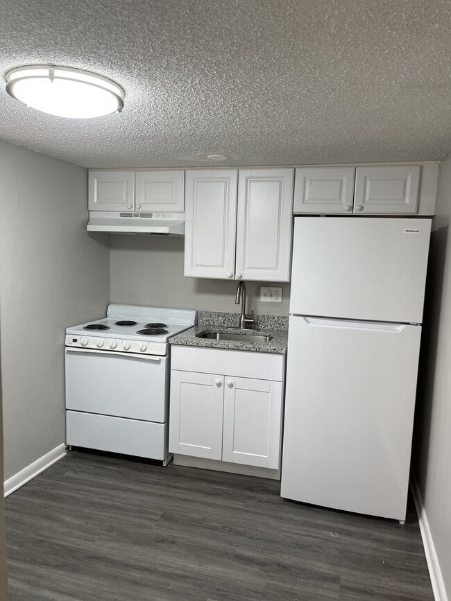 Estudio Lotus Lux con lavadora y secadora - Country View Garden Homes