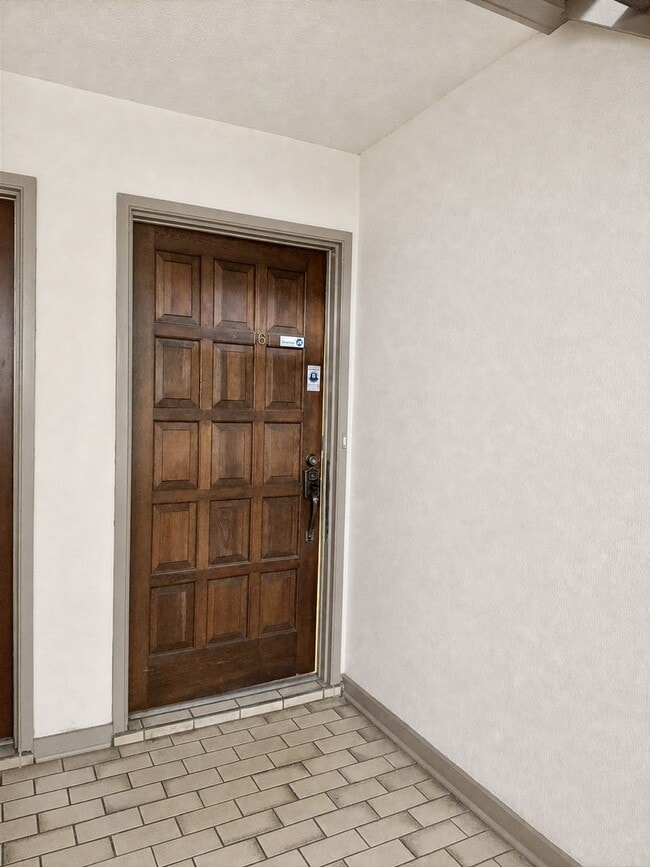 Photo - Single-level living on ground floor  |  Fresh paint (July 2026)  |  2 carports  |  Community Pool...