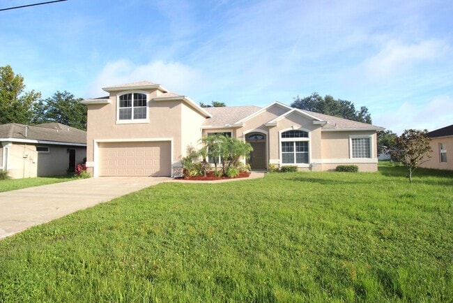 Photo - Huge 4 Bed 3 Bath Home w FENCED YARD and SCREENED LANAI for Rent!