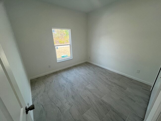 Photo - MODERN BRAND NEW 4BD/2BA RETREAT IN LEHIGH ACRES!