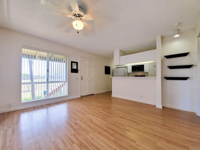 Photo - For Rent | 1 bedroom, 1 bath upstairs corner unit located in Sun Rise with 1 assigned parking stall
