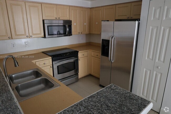 Building Photo - 6801 SW 44th St Unit 202 Rental