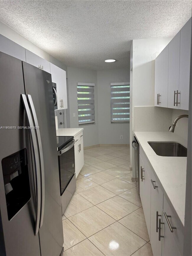 Photo - 1200 SW 124th Terrace Unit 202-O