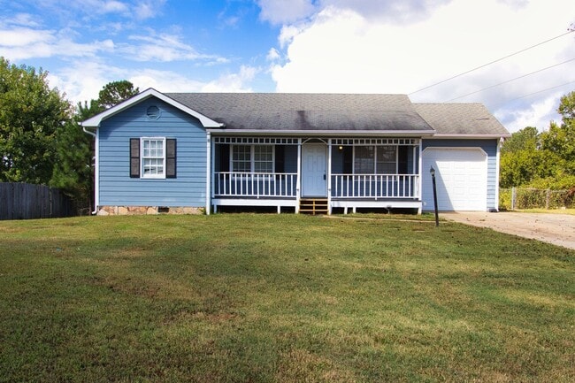 Building Photo - MOVE IN READY– Loganville Gem with Large Fenced Yard & Outdoor Living!