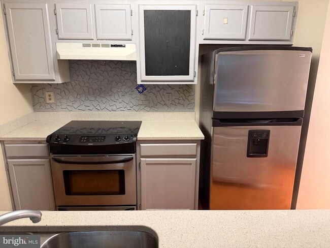 Building Photo - 14203 Wolf Creek Pl Unit 4-23
