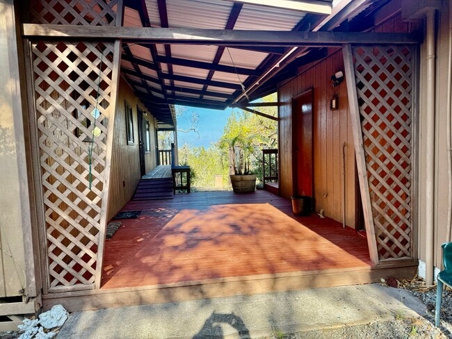 Photo - Experience comfort in this charming 3 bed, 2 bath rental home with a wood-burning stove, sunken j...