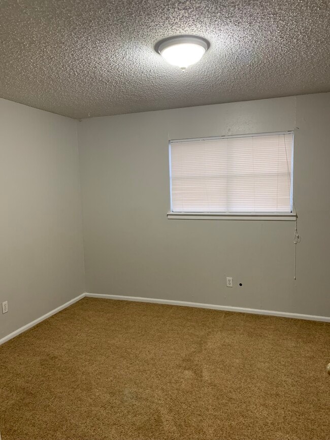 Photo - WoodCreek Apartments Unit 101